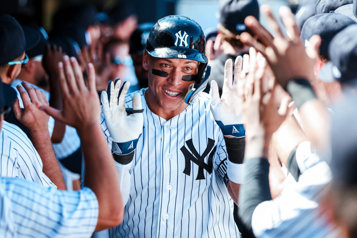 Yankees captain Aaron Judge celebrates in dugout after his second homer in spring win over the Tigers, Tampa, Fl. Feb. 21, 2026.