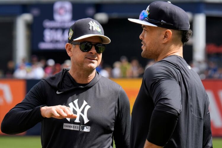 Yankees manager Aaron Boone is delaying designated hitter Giancarlo Stanton's spring debut to around March 3.