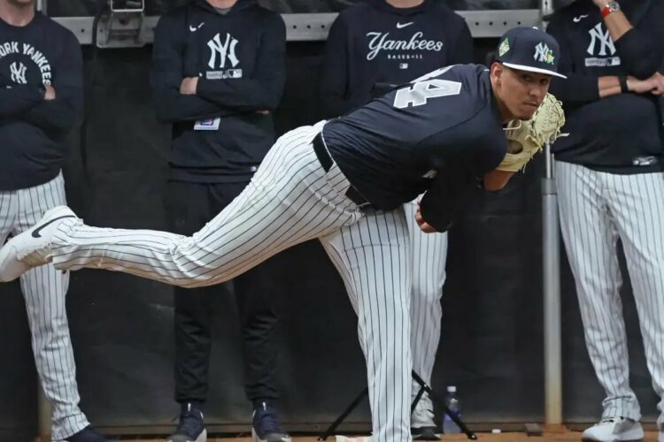 Yankees prospect Carlos Lagrange throws a pitch during his Feb. 14, 2026 bullpen session.
