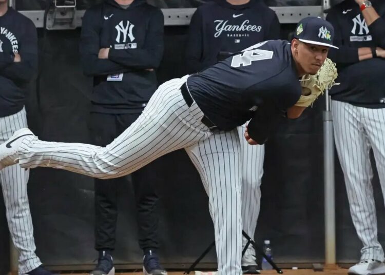 Yankees prospect Carlos Lagrange throws a pitch during his Feb. 14, 2026 bullpen session.