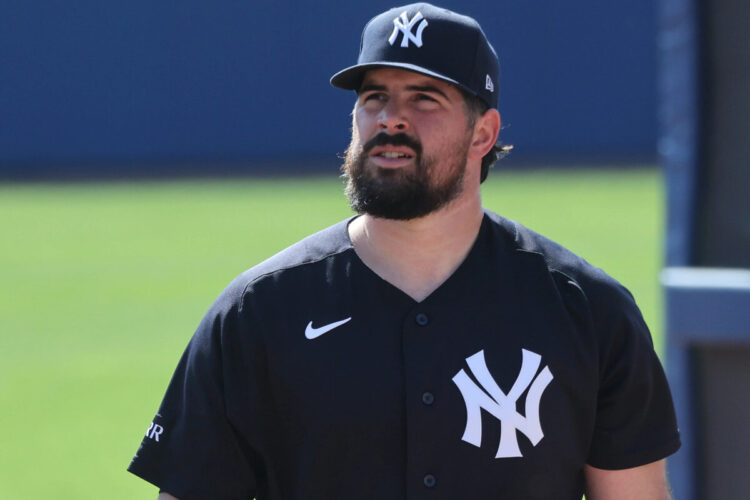 New York Yankees pitcher Carlos Rodón walking to the bullpen at Steinbrenner Field in Tampa, Florida.