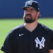 New York Yankees pitcher Carlos Rodón walking to the bullpen at Steinbrenner Field in Tampa, Florida.