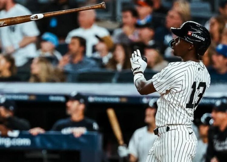 Jazz Chisholm Jr. hits a home run in the Yankees' 9-6 win over the Blue Jays in New York, Oct. 7, 2025.