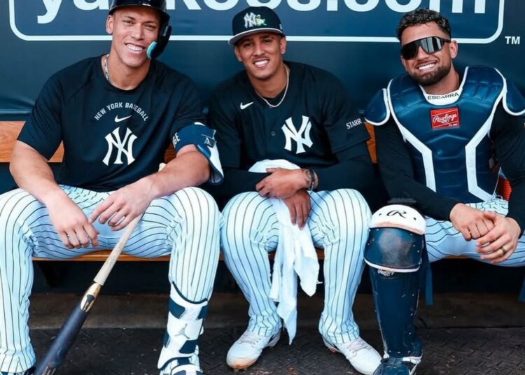 Carlos Lagrange is with Aaron Judge and J.C. Escarra after throwing 102.6 mph pitch during the Yankees spring training. Feb. 16, 2026 .