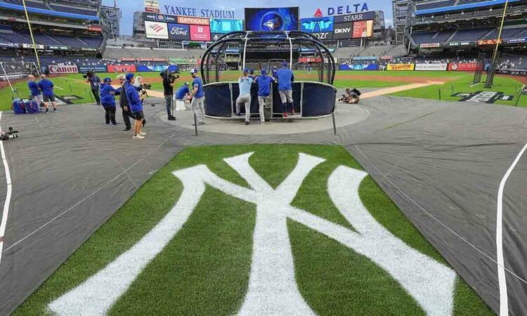The Toronto Blue Jays take batting practice before playing against the New York Yankees in Game 3 of baseball's American League Division Series on Oct. 7, 2025, in New York.