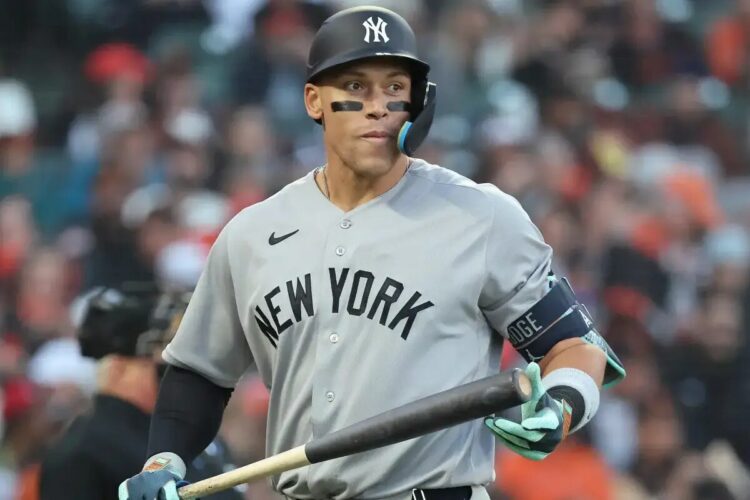 Yankees right fielder Aaron Judge (99) reacts after he strikes out for the fourth time during the sixth inning on Opening Day.