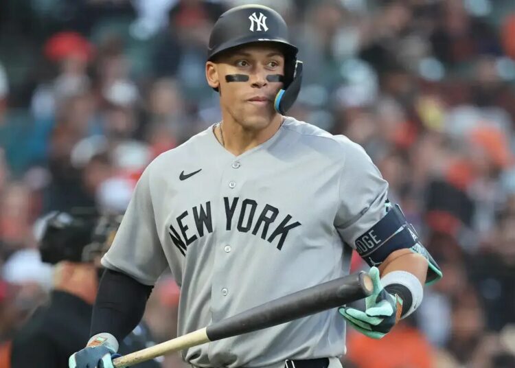 Yankees right fielder Aaron Judge (99) reacts after he strikes out for the fourth time during the sixth inning on Opening Day.