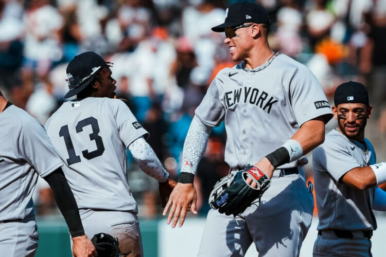 Yankees captain Aaron Judge and Jazz Chisholm celebrate after 3-0 win over the Giants in San Francisco, March 27, 2026.