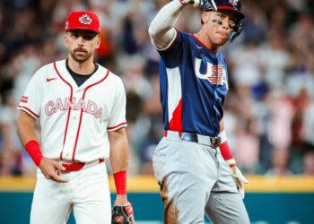 Yankees captain celebrates after reaching base against Canada in Team USA's win on March 13, 2026.