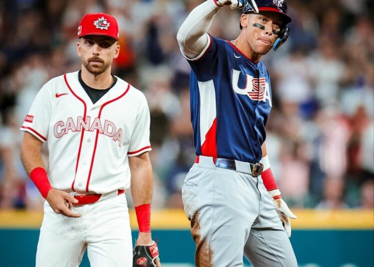 Yankees captain celebrates after reaching base against Canada in Team USA's win on March 14, 2026.