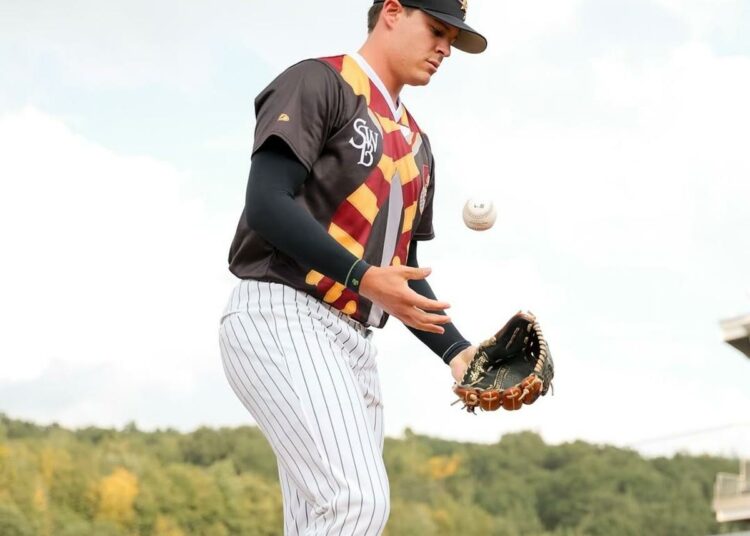 Yankees' pitching prospect Brendan Beck stand at the mound prior to a Triple-A game in 2025.