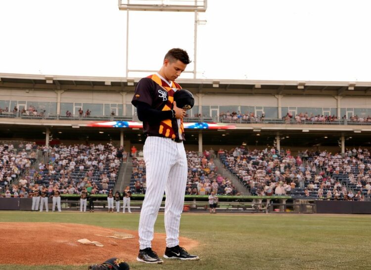 Yankees' pitching prospect Brendan Beck stand at the mound prior to a Triple-A game in 2025.