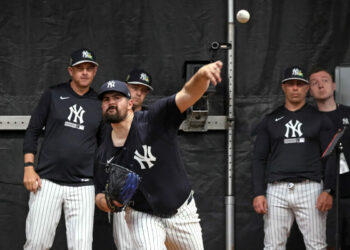 New York Yankees pitcher Carlos Rodón throwing in the bullpen during Saturday’s workout at Steinbrenner Field in Tampa, Florida.