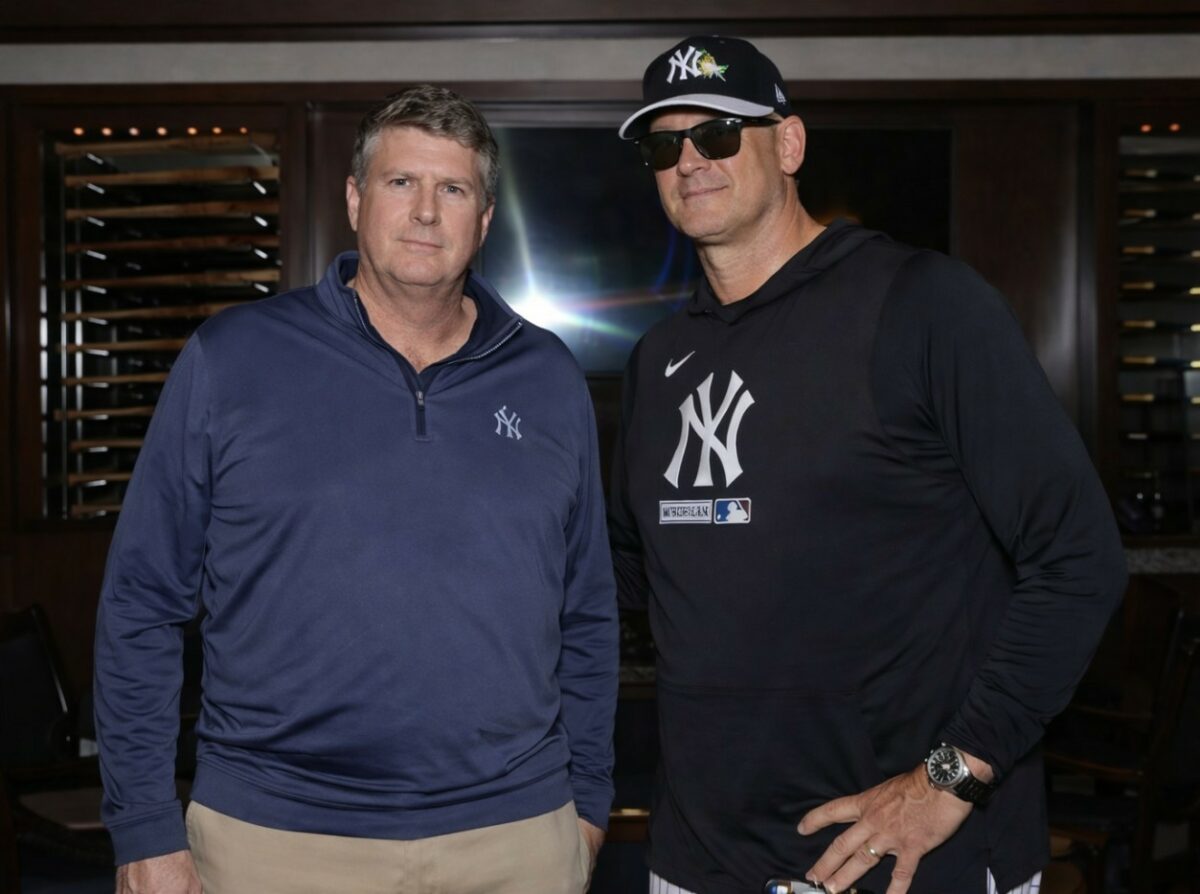 Yankees owner Hal Steinbrenner and manager Aaron Boone, March 2026.