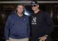 Yankees owner Hal Steinbrenner and manager Aaron Boone, March 2026.