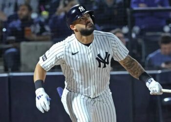 Jasson Domínguez takes a swing during a spring training game.