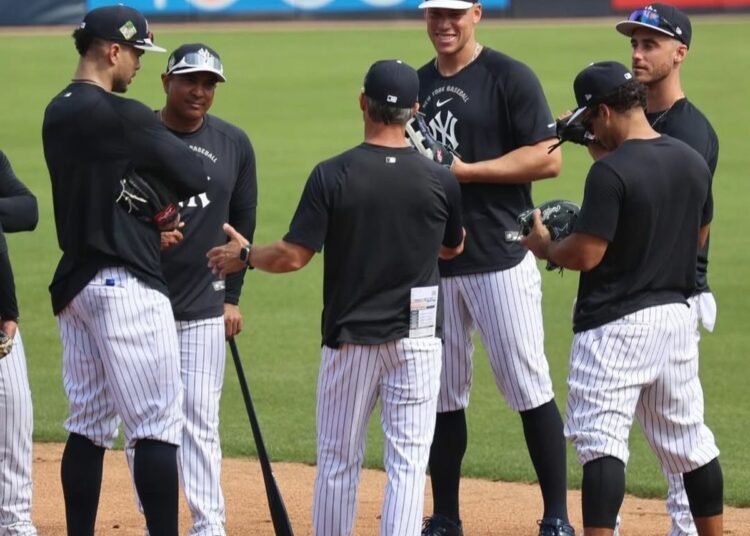 Captain Aaron Judge and Giancarlo Stanton are at a Yankees team meeting, Feb, 24, Tampa, FL.