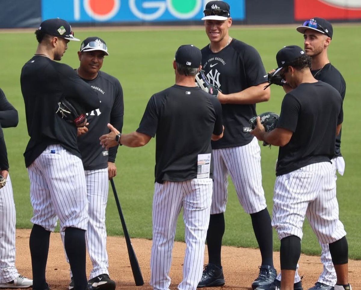 Captain Aaron Judge and Giancarlo Stanton are at a Yankees team meeting, Feb, 24, Tampa, FL.