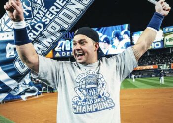 New York Yankees' Nick Swisher celebrates after the World Series win, Nov. 4, 2009, Yankee Stadium, New York.