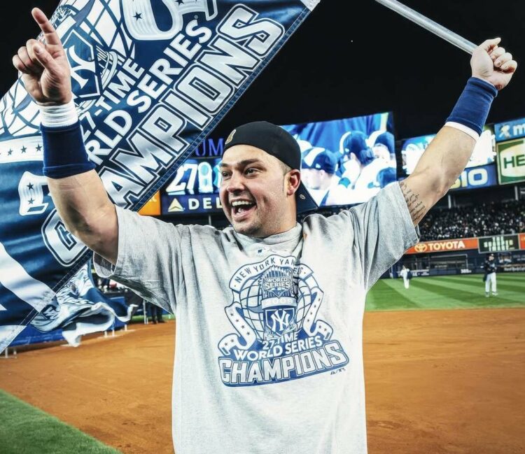 New York Yankees' Nick Swisher celebrates after the World Series win, Nov. 4, 2009, Yankee Stadium, New York.
