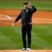Former New York Yankees' Nick Swisher salutes the crowd before throwing out the ceremonial first pitch before Game 2 of the baseball AL Championship Series between the Cleveland Guardians and New York Yankees Tuesday, Oct. 15, 2024, in New York.