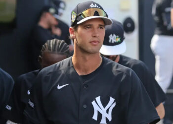 Yankees outfielder Spencer Jones looks on from from the dugout earlier in spring training.