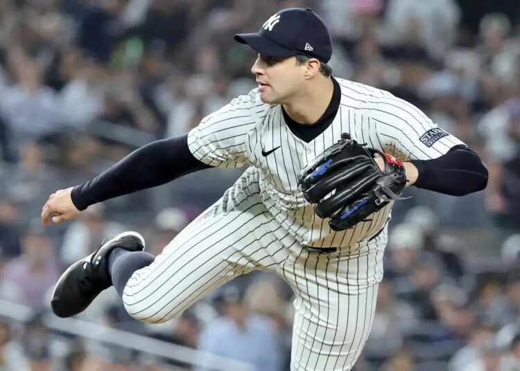Tommy Kahnle pitching during the 2024 World Series for the Yankees.