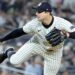 Tommy Kahnle pitching during the 2024 World Series for the Yankees.