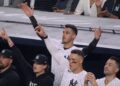 Yankees stars in the dugoutt react as Trent Grisham's home run gave them a lead in the 11-10 win over the Angels in New York, Apr. 13, 2026.