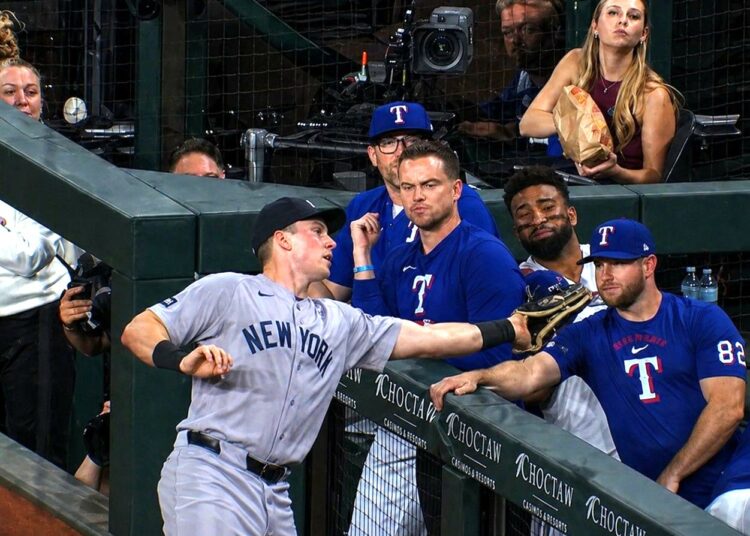 Ben Rice made a catch in foul territory and in the Rangers dugout in the 2nd inning of the Yankees' 4-2 win in Texas, Apr. 27, 2026.
