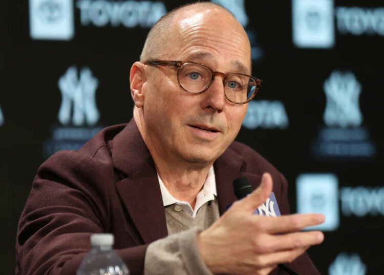 New York Yankees GM Brian Cashman speaking to the media at a press conference held at Yankee Stadium.