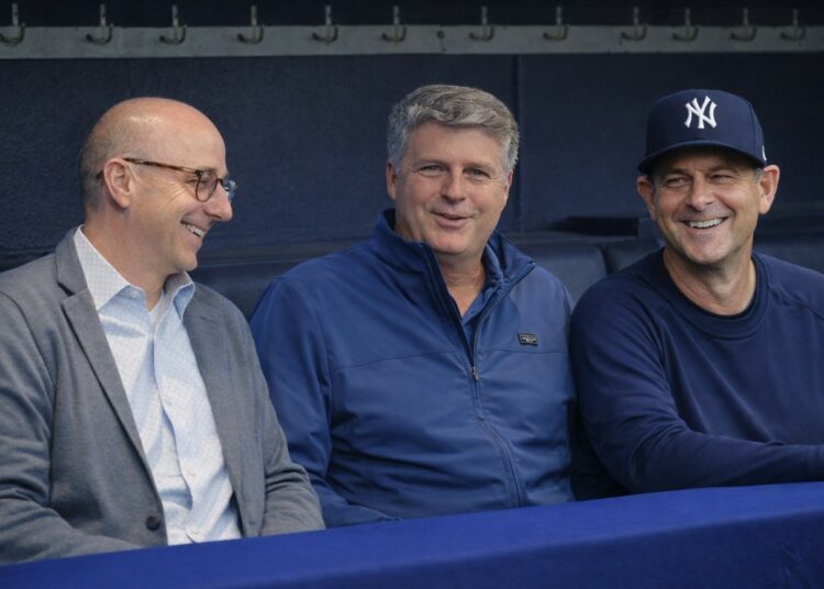 New York Yankees GM Brian Cashman, managing owner Hal Steinbrenner, and manager Aaron Boone in 2025.