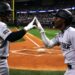 Jasson Dominguez and Jazz Chisholm celebrate after the latter's home run in the Yankees' 4-2 wn over the Rangers, Texas, Apr 27. 2026.
