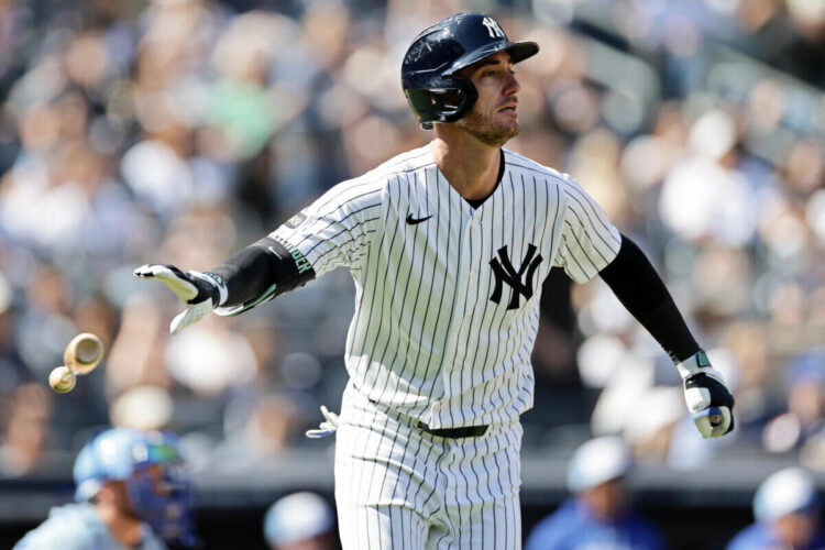 New York Yankees’ Cody Bellinger watches his two-run home run during the sixth inning of a baseball game against the Kansas City Royals, Saturday, April 18, 2026, in New York.