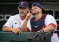 Boston Red Sox coach Alex Cora and their catcher Carlos Narvaez in 2026.