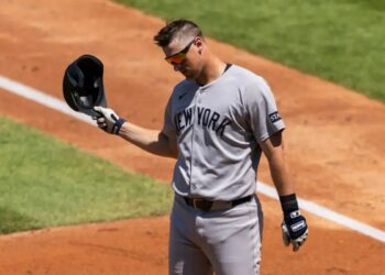 DJ LeMahieu of the New York Yankees reacts after he strikes out looking.