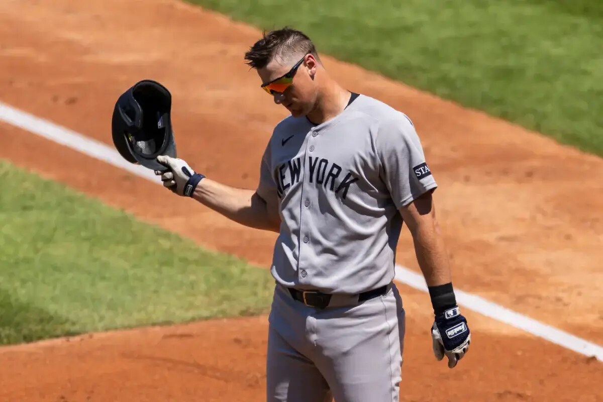 DJ LeMahieu of the New York Yankees reacts after he strikes out looking.