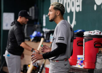 New York Yankees starting pitcher Elmer Rodriguez stands in the dugout after being pulled in the fifth inning of a baseball game against the Texas Rangers Wednesday, April 29, 2026, in Arlington, Texas.