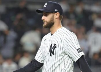 Jake Bird #59 reacts as he walks back to the dugout after ending the 6th inning.