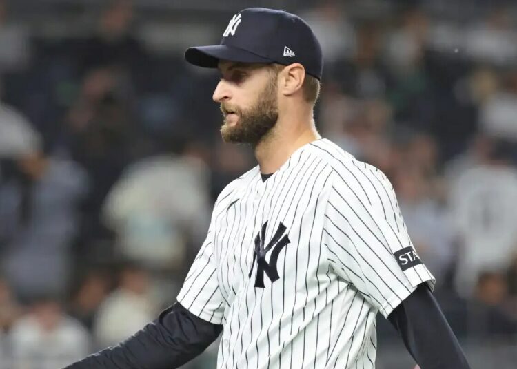 Jake Bird #59 reacts as he walks back to the dugout after ending the 6th inning.