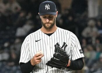 Jake Bird (59) reacts after giving Miami Marlins third baseman Graham Pauley (21) a two-run RBI double during the 8th inning of the Yankees and Miami Marlins game at Yankee Stadium.