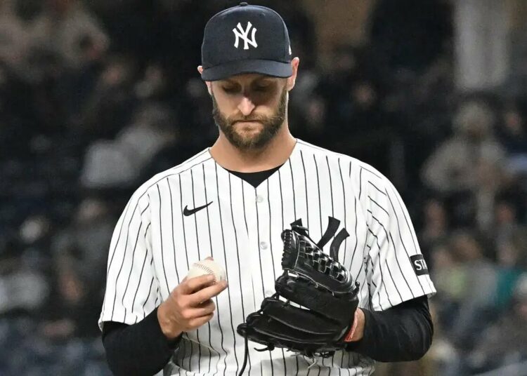 Jake Bird (59) reacts after giving Miami Marlins third baseman Graham Pauley (21) a two-run RBI double during the 8th inning of the Yankees and Miami Marlins game at Yankee Stadium.