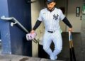 Yankees' Jasson Dominguez is making acomic walkthrough as he clim stairs at Yankee Stadium, 2025.