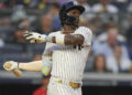 New York Yankees’ Jazz Chisholm Jr. hits an RBI single during the second inning of a baseball game against the Boston Red Sox, Friday, June 6, 2025, in New York.