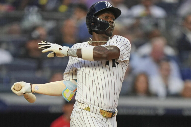 New York Yankees’ Jazz Chisholm Jr. hits an RBI single during the second inning of a baseball game against the Boston Red Sox, Friday, June 6, 2025, in New York.