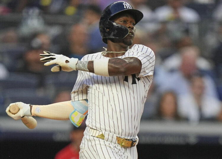 New York Yankees’ Jazz Chisholm Jr. hits an RBI single during the second inning of a baseball game against the Boston Red Sox, Friday, June 6, 2025, in New York.