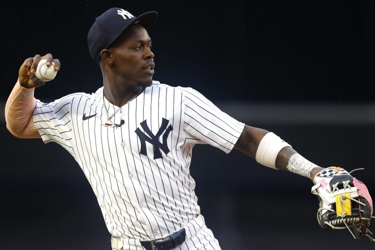 New York Yankees' Jazz Chisholm Jr. throws the ball before the start of MLB baseball game against the Boston Red Sox, Sunday, June 8, 2025, in New York.