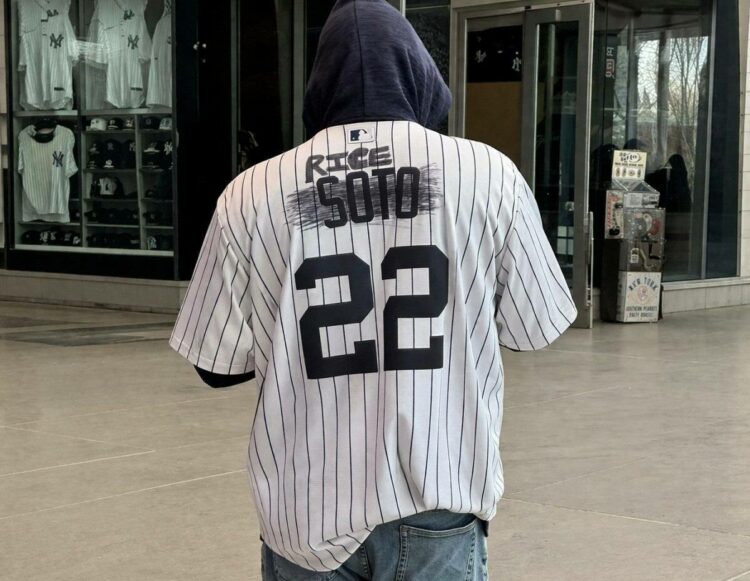 A Yankees fan wears a no. 22 jersey that previously belonged to Juan Soto but now allotted to Ben Rice. New York. Apr 5, 2026.