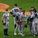 The Yankees players are looking at a replay during the 3-2 nail-biter win over the Rangers in Texas on Apr. 28, 2026.