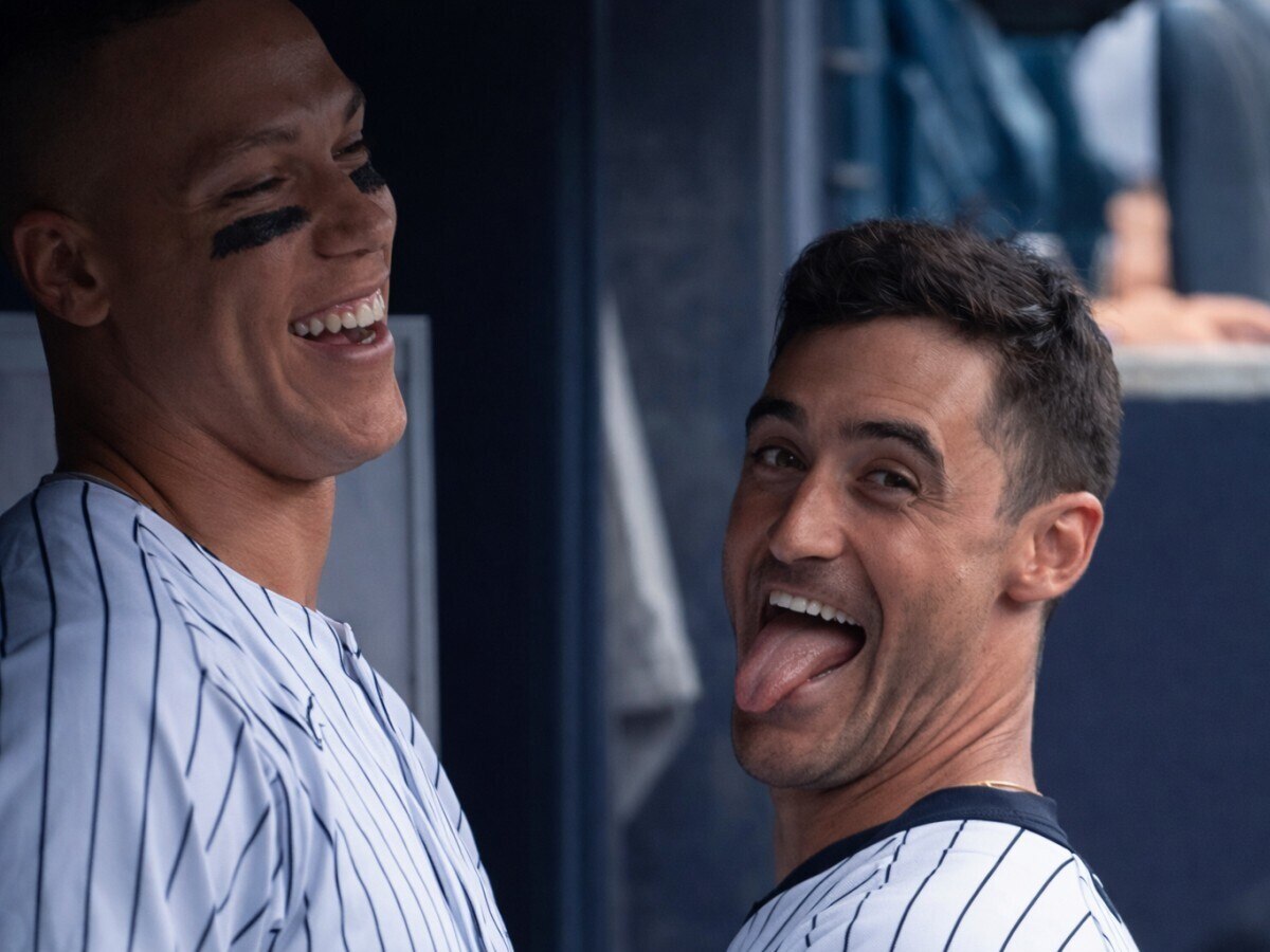 Aaron Judge and Cody Bellinger enjoy a lighter moment at dugout in the Yankees' 7-0 win over the Royals in New York, Apr. 19, 2026.